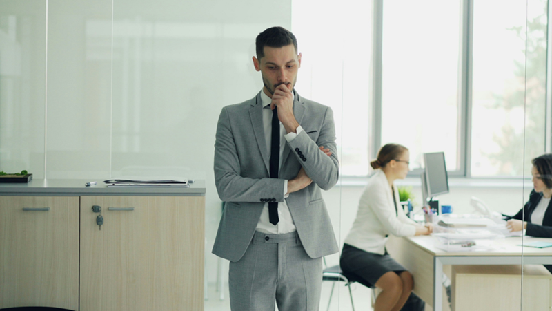 Worried employee before quitting his job.