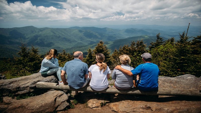 A family gathered together to see the mountains. Image is representative only and does not depict the actual subjects of the story.