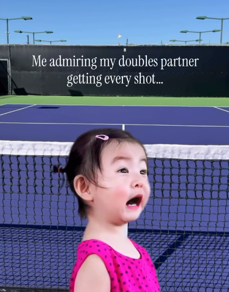 Me admiring my doubles partner getting every shot...