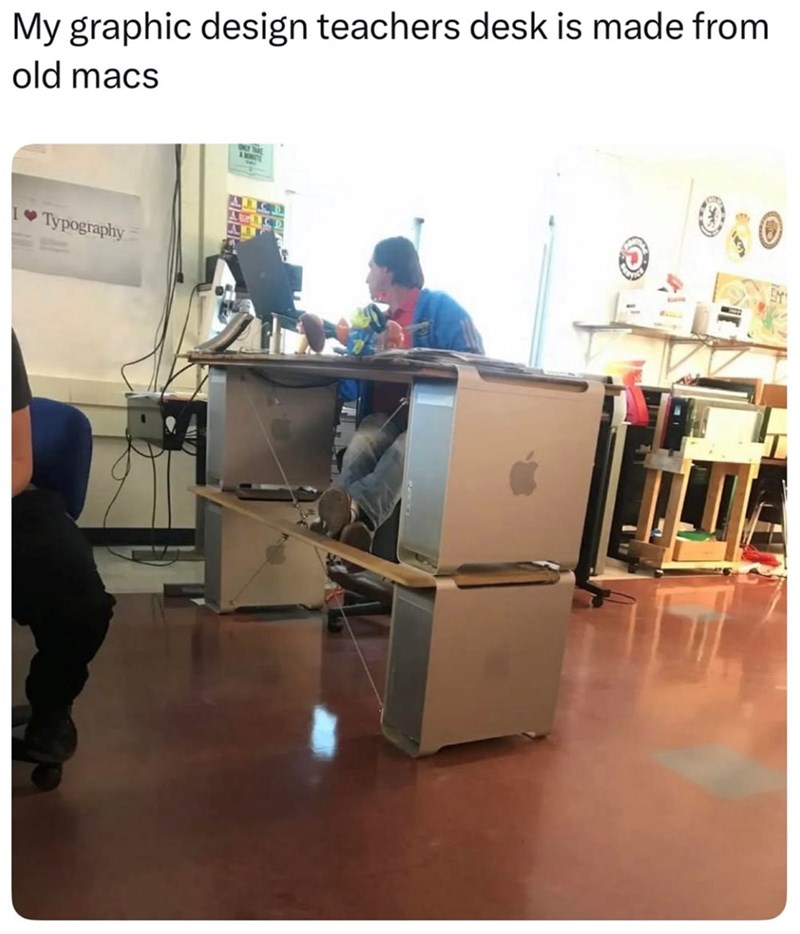 My graphic design teachers desk is made from old macs Typography
