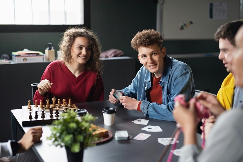 A group of people playing board games.