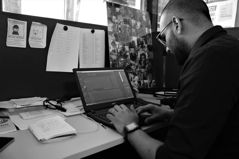 Man working on laptop.