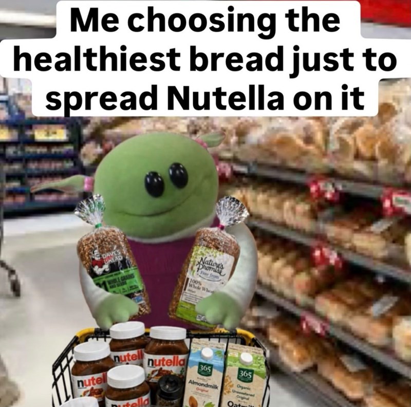 Me choosing the healthiest bread just to spread Nutella on it DAVES READ WHOLE GRAIND 447 Nature's Dromise Free from 100% Whole Whea CA nutell nutella 365 365 nutel Almondmilk Organic Original