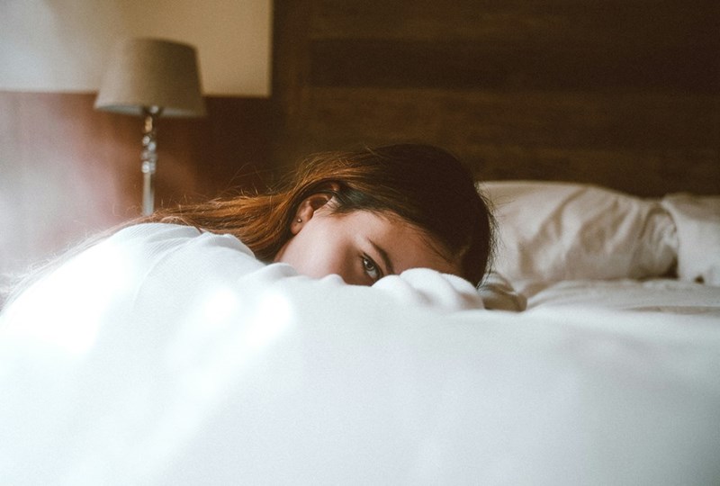 A hotel guest enjoying the suite. Model image.