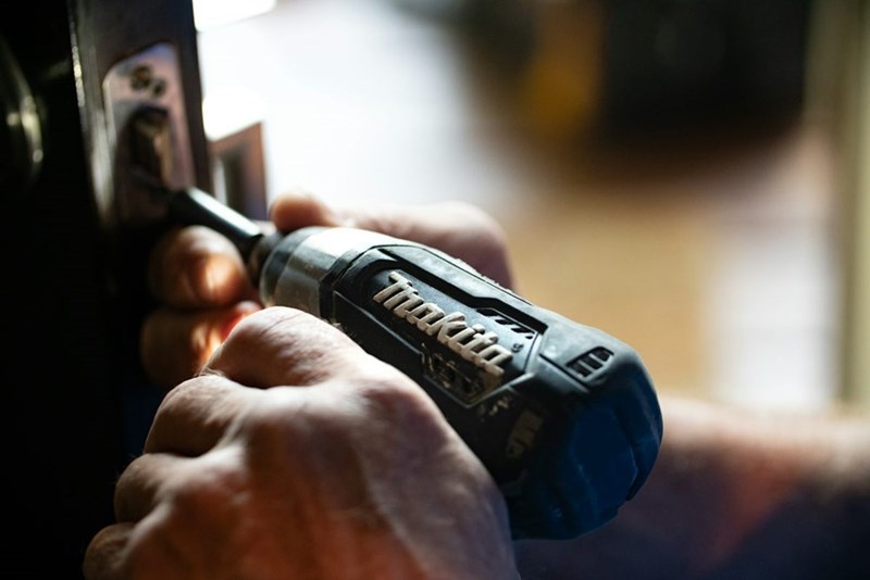 A repairman works