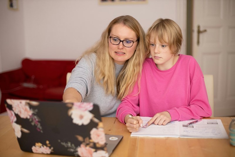 Mother helping teenage daughter get the credit she deserved for the design used on a school mural.