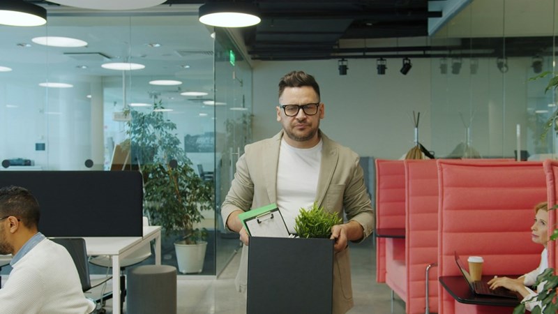 A man getting fired from his job. Model image.