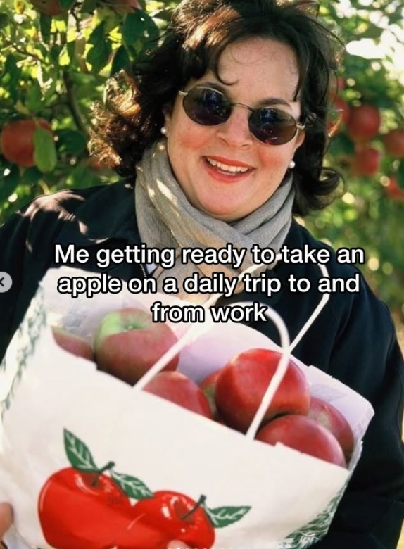 Me getting ready to take an apple on a daily trip to and from work