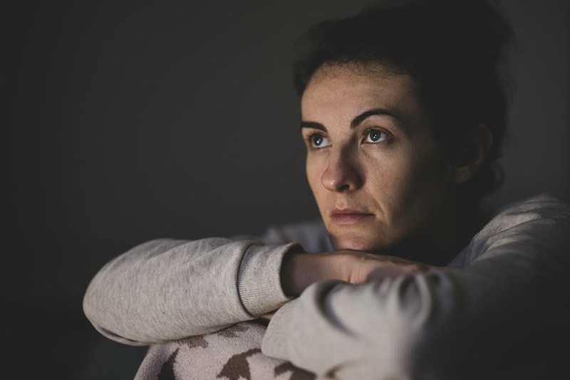 A fed up woman crosses her arms