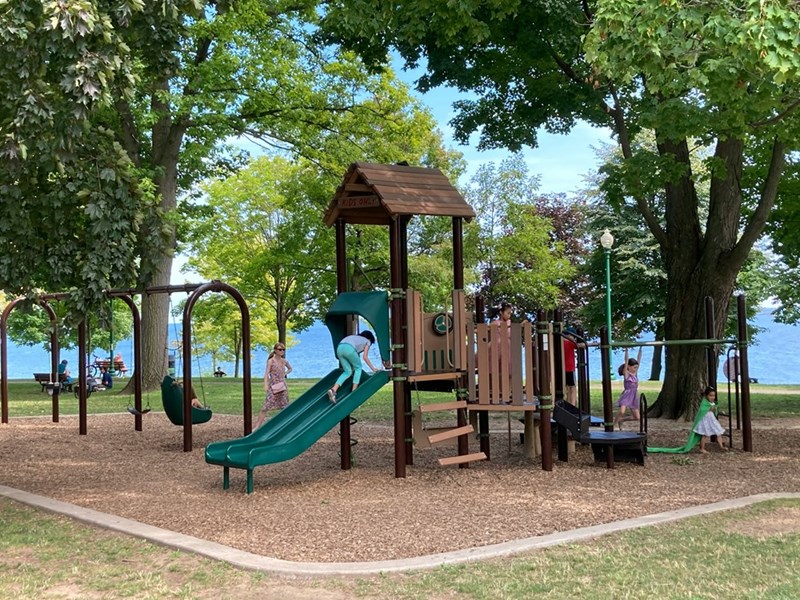 A playground full of kids playing. Stock photography for depiction only.