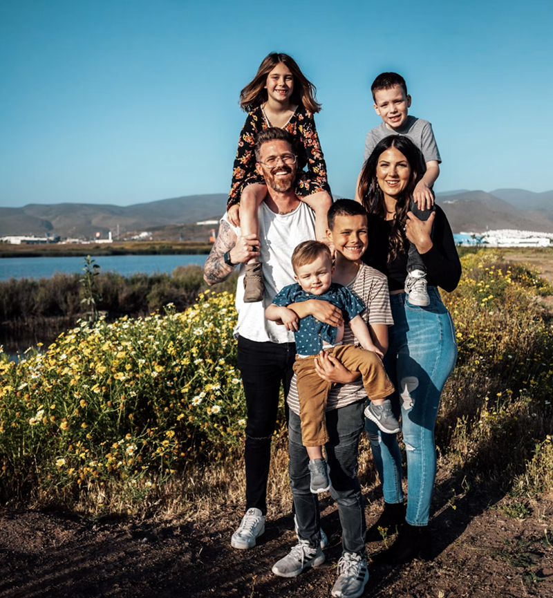 A family is pictured, representing the one in the story.