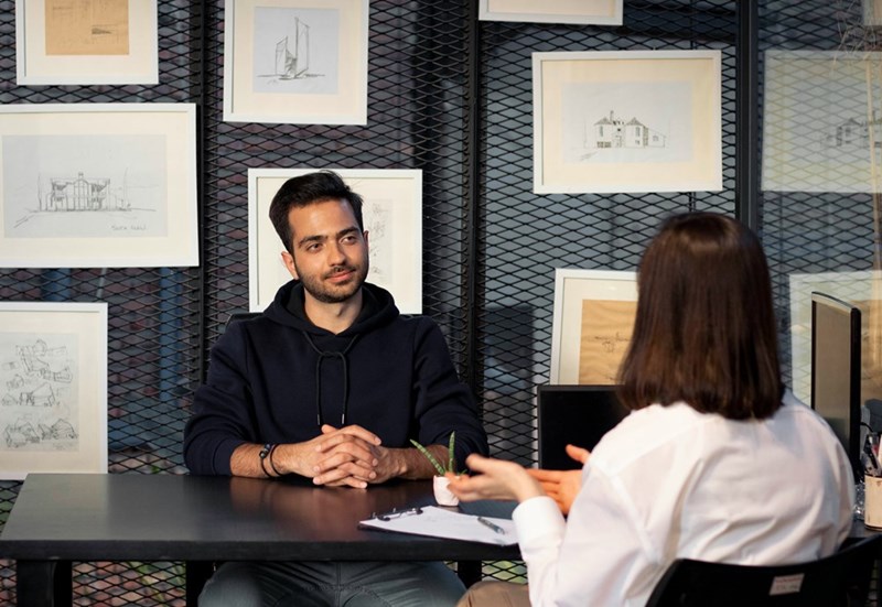 A candidate in an interview with a recruiter. Stock photo unrelated.
