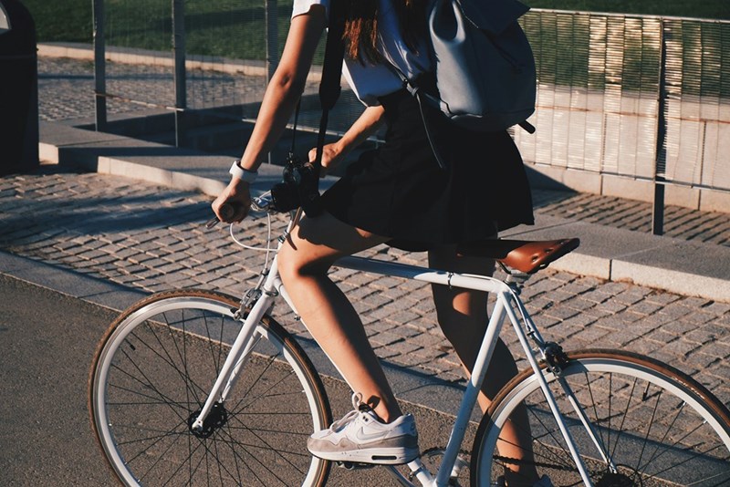 A biker riding through the neighborhood. Image depicted solely for explanatory purposes.