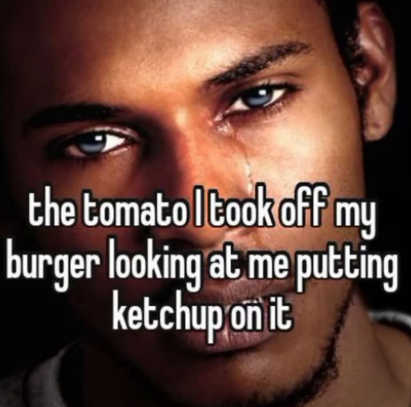 the tomato I took off my burger looking at me putting ketchup on it