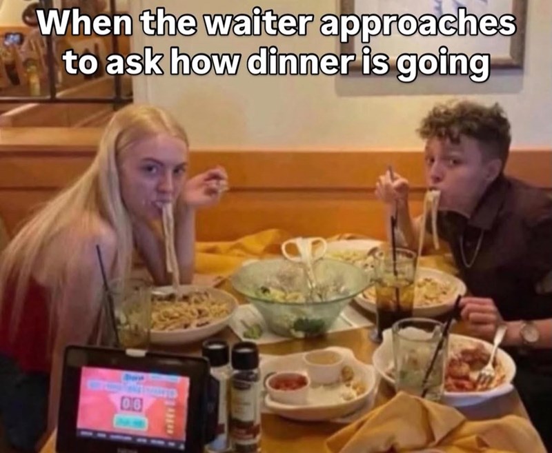 When the waiter approaches to ask how dinner is going 06