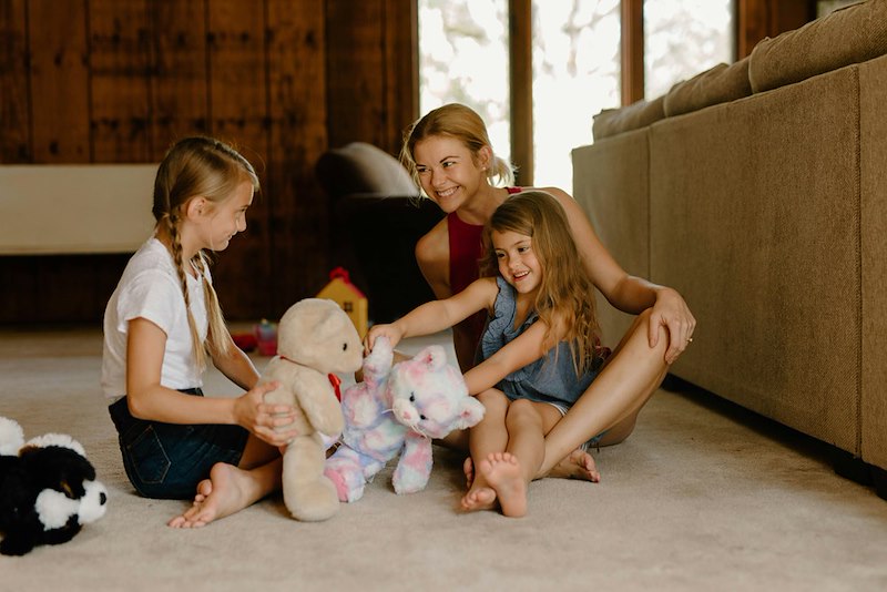 A young woman spends time entertaining children after unexpectedly being left to her relative's kids during a family dinner.