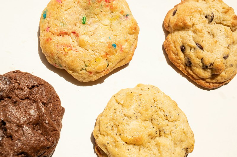 A close-up of four different cookies.