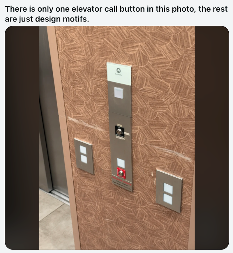 There is only one elevator call button in this photo, the rest are just design motifs.