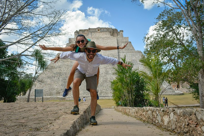 A couple enjoying their honeymoon vacation. Still frame for contextual reference only.