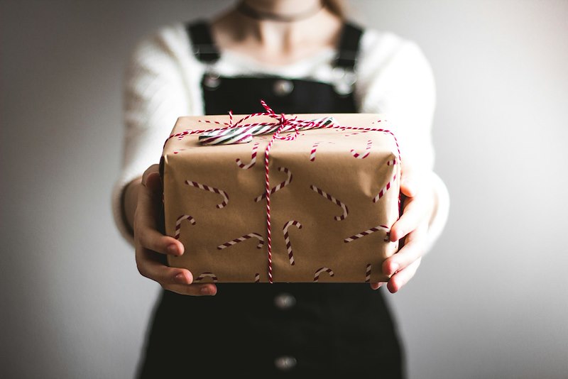 The sister giving an unexpected gift. Scene is illustrative and does not depict actual individuals or events.
