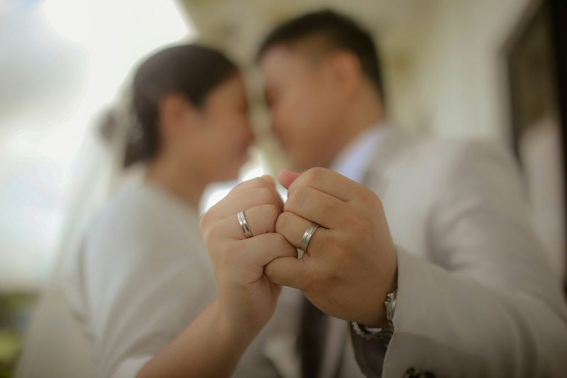A married couple after the ceremony. Stock photo unrelated.