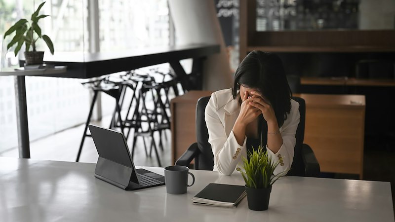 Sad female employee.