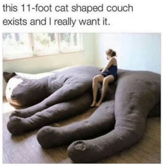 this 11-foot cat shaped couch exists and I really want it.