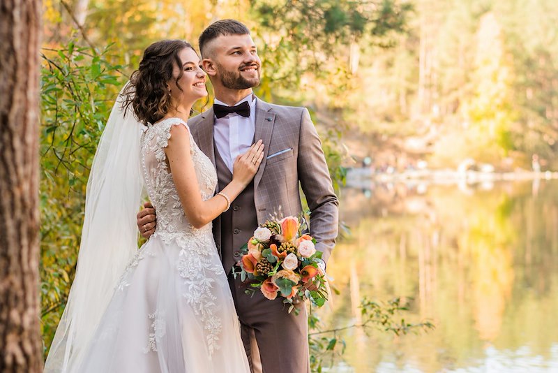 A couple getting married at their wedding. Representative only.