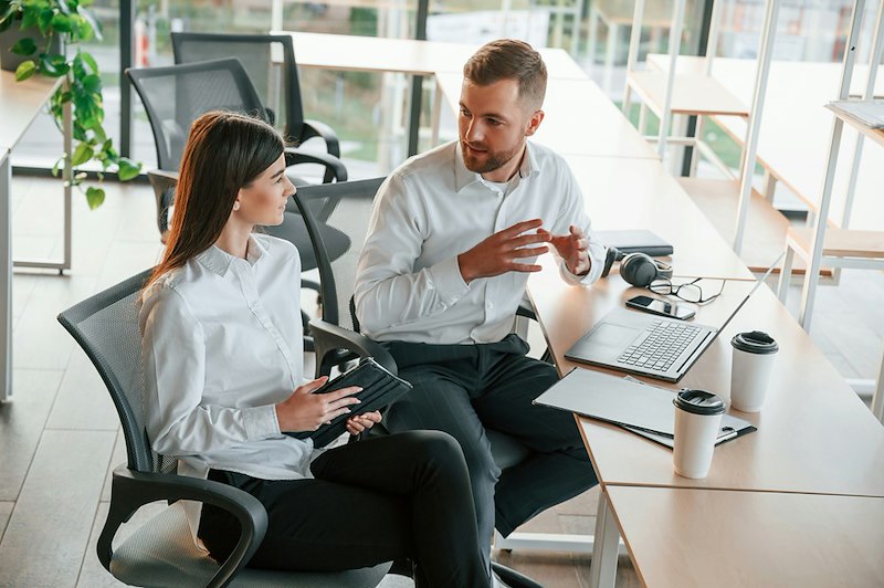 Employee discusses a work project with his manager before she takes credit for weeks of his work in front of company leadership.