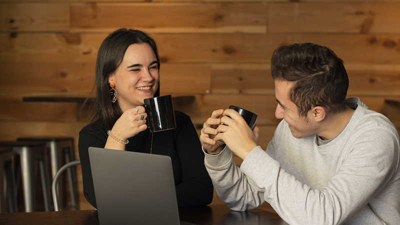 Two friends having coffee.