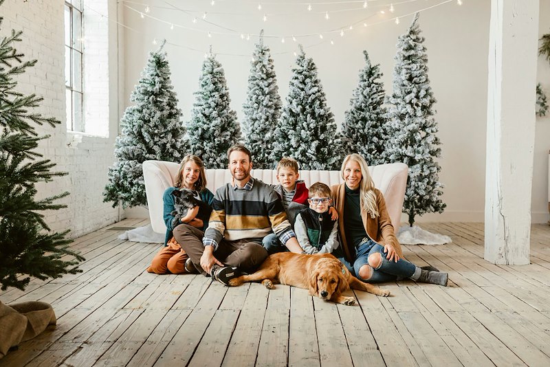 A family posing in their Christmas pyjamas. Featured likenesses do not identify those mentioned.
