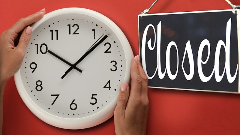 A composite image of an employee holding a clock and a closed sign providing context to the issues discussed in the post.