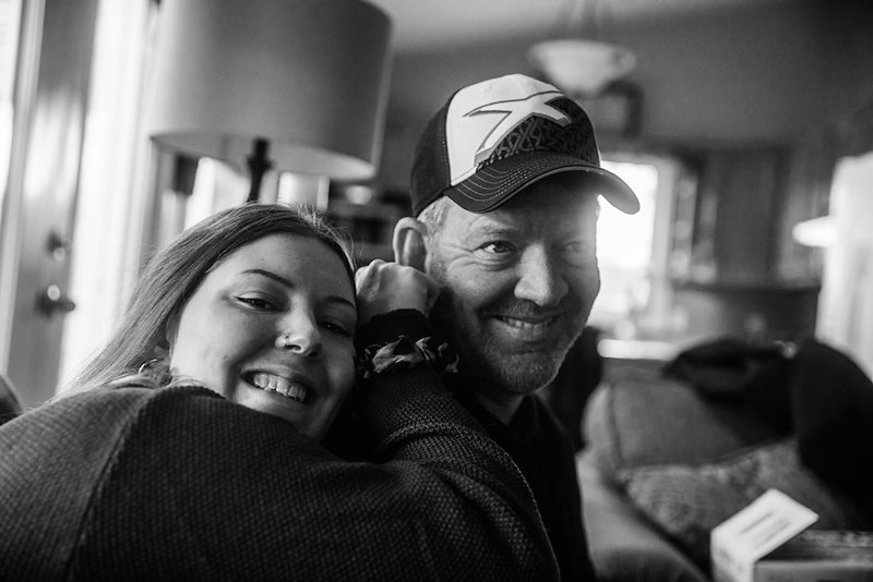 Father and adult daughter spending time together. Not actual story subjects.