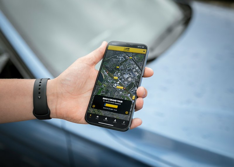 Close-up of a smartphone displaying a location tracking app.
