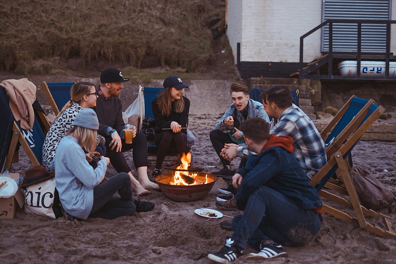 A group of friends hanging out outside. Image is representative only and does not depict the actual subjects of the story.
