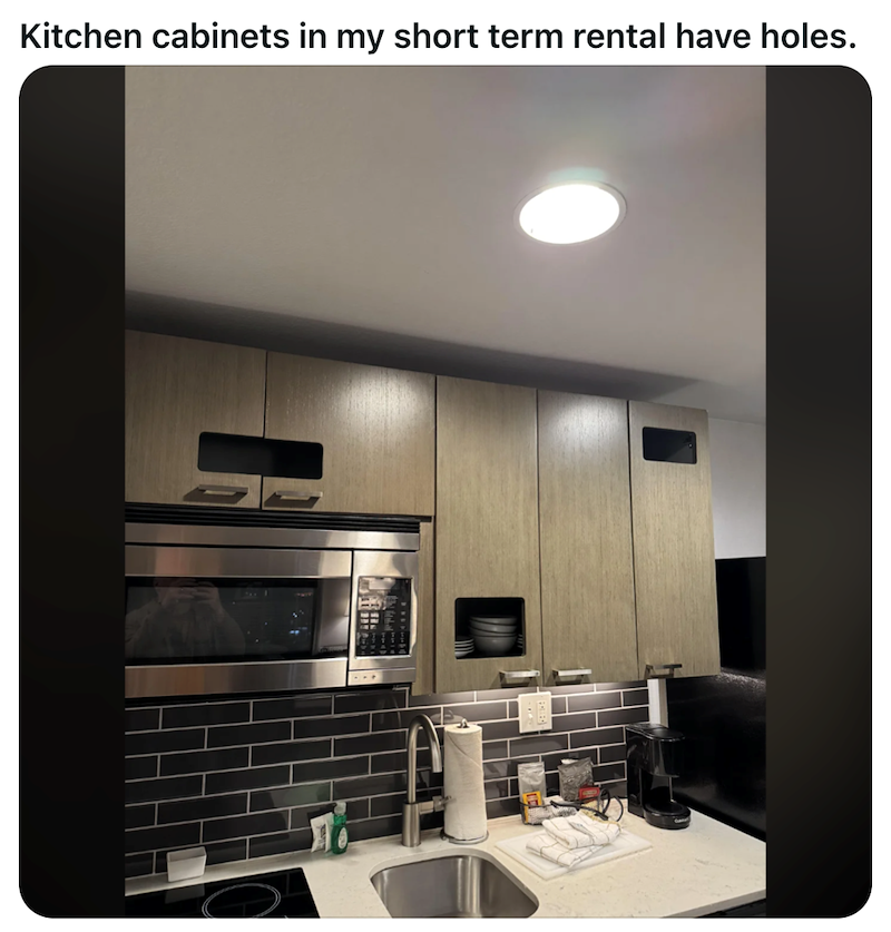Kitchen cabinets in my short term rental have holes.