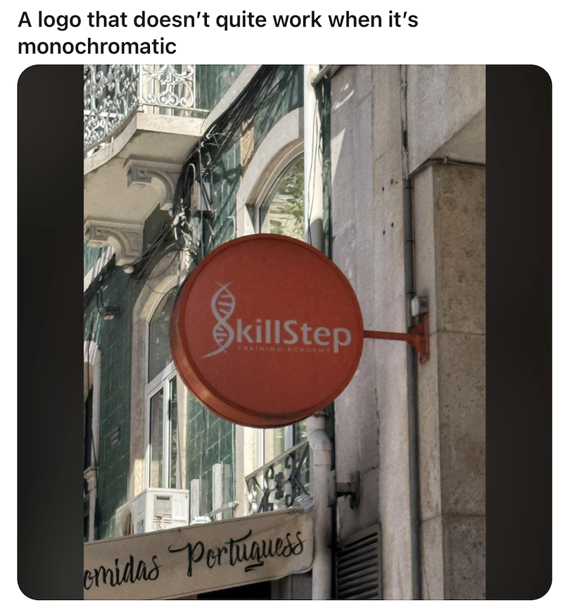 A logo that doesn't quite work when it's monochromatic SkillStep TRAINING ACADEMY omidas Portuguess