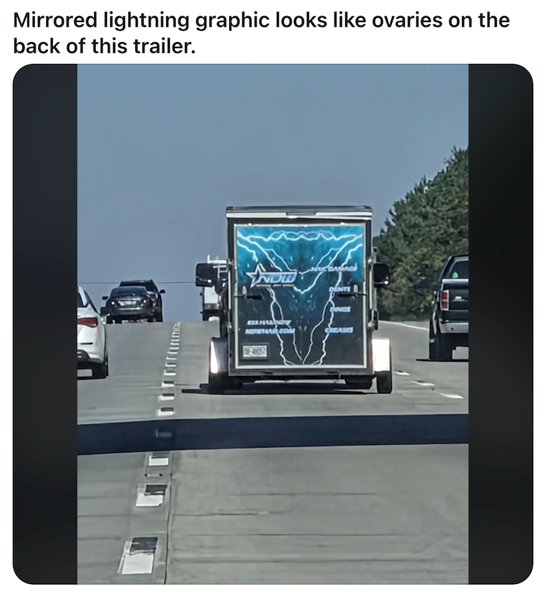 Mirrored lightning graphic looks like ovaries on the back of this trailer. DINTS