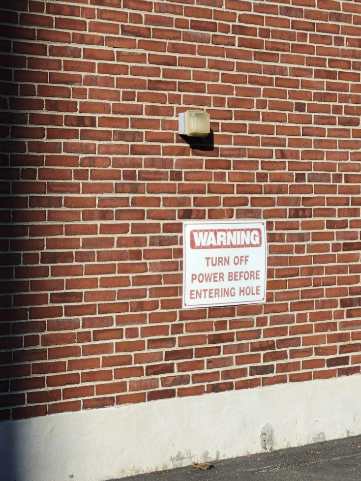 WARNING TURN OFF POWER BEFORE ENTERING HOLE