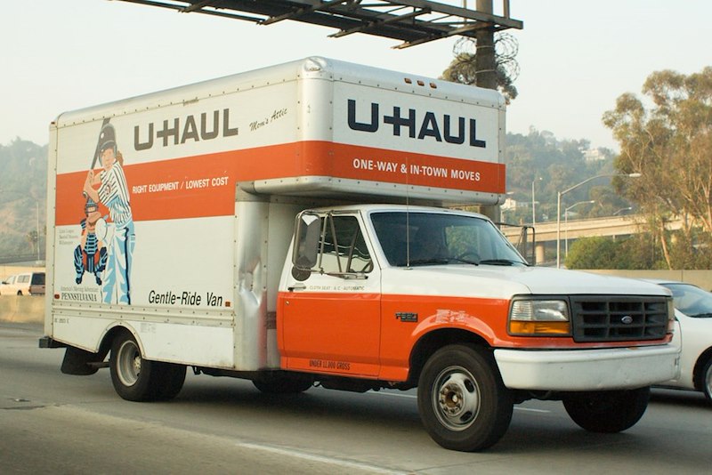 A classic moving truck, representing the move in the story.