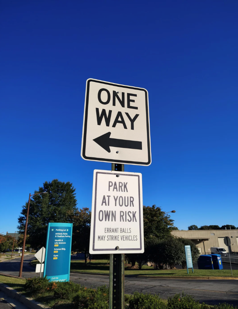 ONE WAY Parking Lot D Athletic Field & Stadium Parking Health & Life Sciences Science Bldg PARK AT YOUR OWN RISK ERRANT BALLS MAY STRIKE VEHICLES Gym Exit to