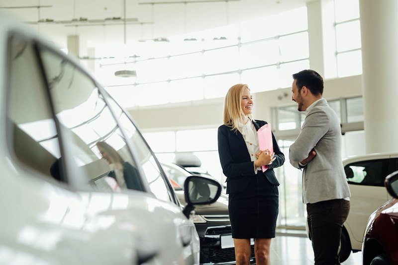 To car salespersons talk in the dealership