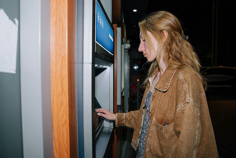 19-year-old daughter using ATM behind father's back.