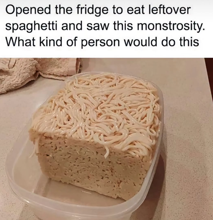 Opened the fridge to eat leftover spaghetti and saw this monstrosity. What kind of person would do this