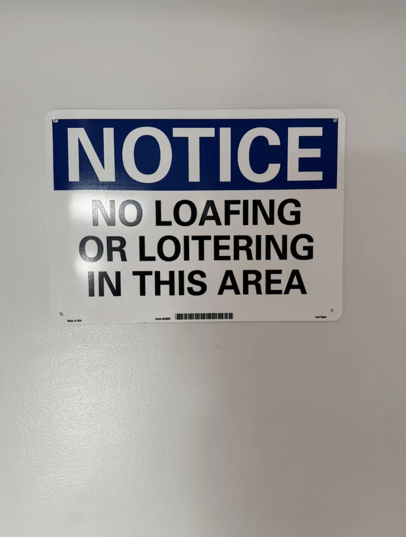 NOTICE NO LOAFING OR LOITERING IN THIS AREA