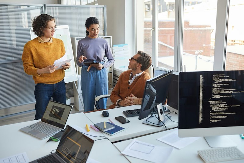The team discusses the boss's delegation requests.