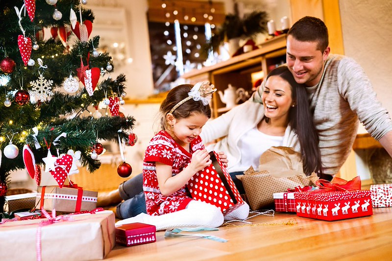 A young family spends Christmas together after deciding to stay home and have a private celebration.