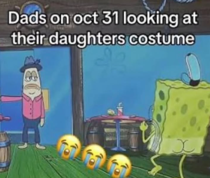 Dads on oct 31 looking at their daughters costume