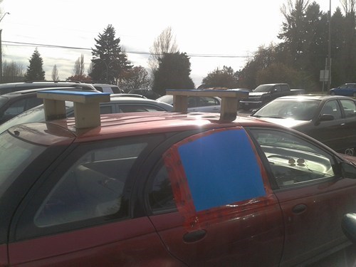 roof rack,windows,cars,wood,tape,there I fixed it
