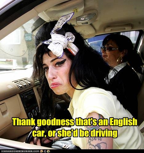 Thank goodness that's an English car, or she'd be driving